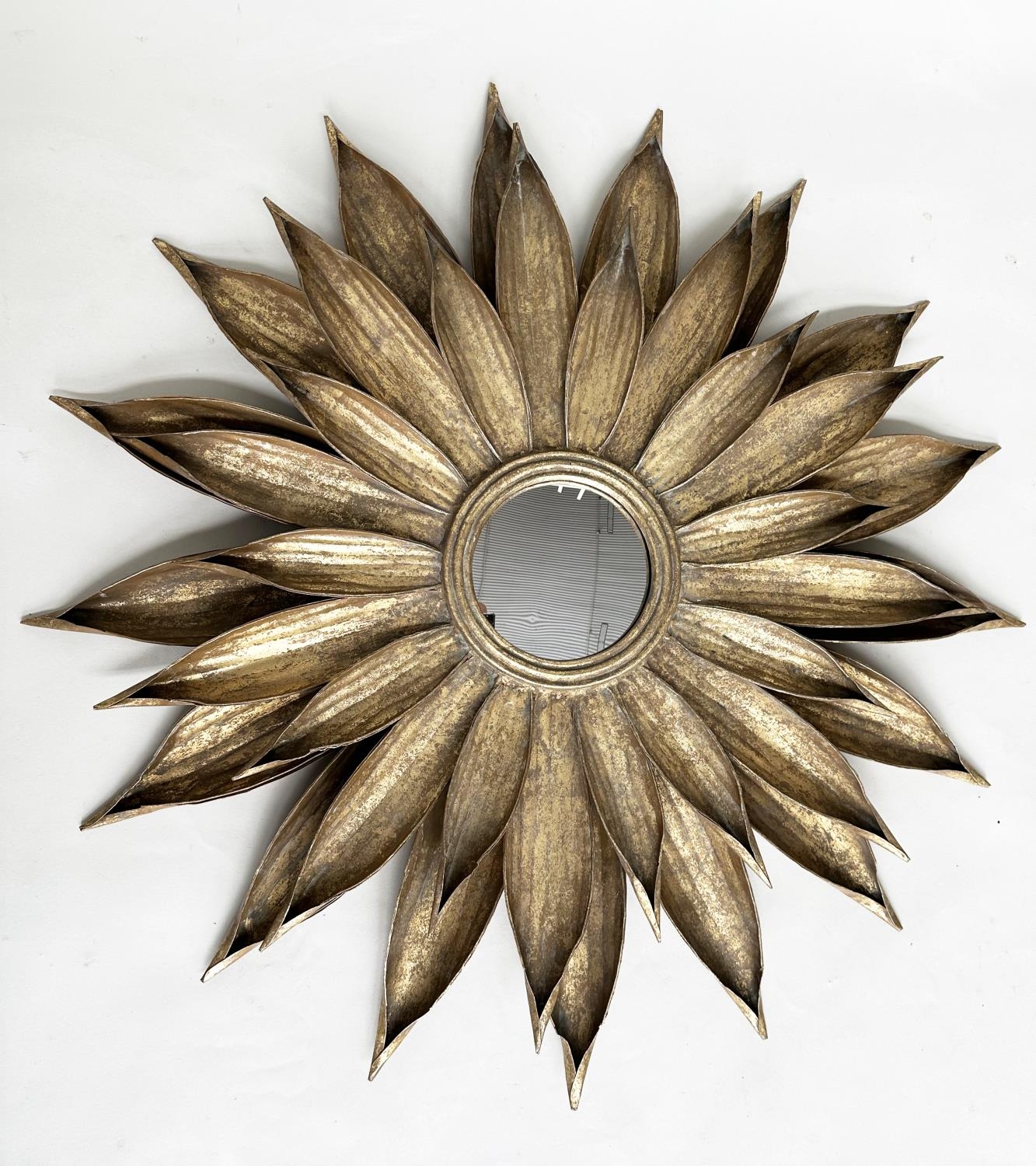 STARBURST WALL MIRROR, circular plate with starburst gilt metal radiating frame, 87cm W.