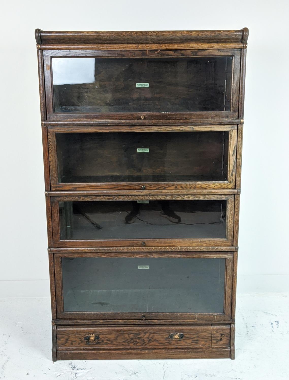 GLOBE WERNICKE BOOKCASE, early 20th century oak, four tier with glazed doors and drawer to base, - Image 8 of 9