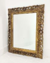 FLORENTINE MIRROR, 19th century Italian rectangular carved giltwood pierced frame, 83cm x 66cm.