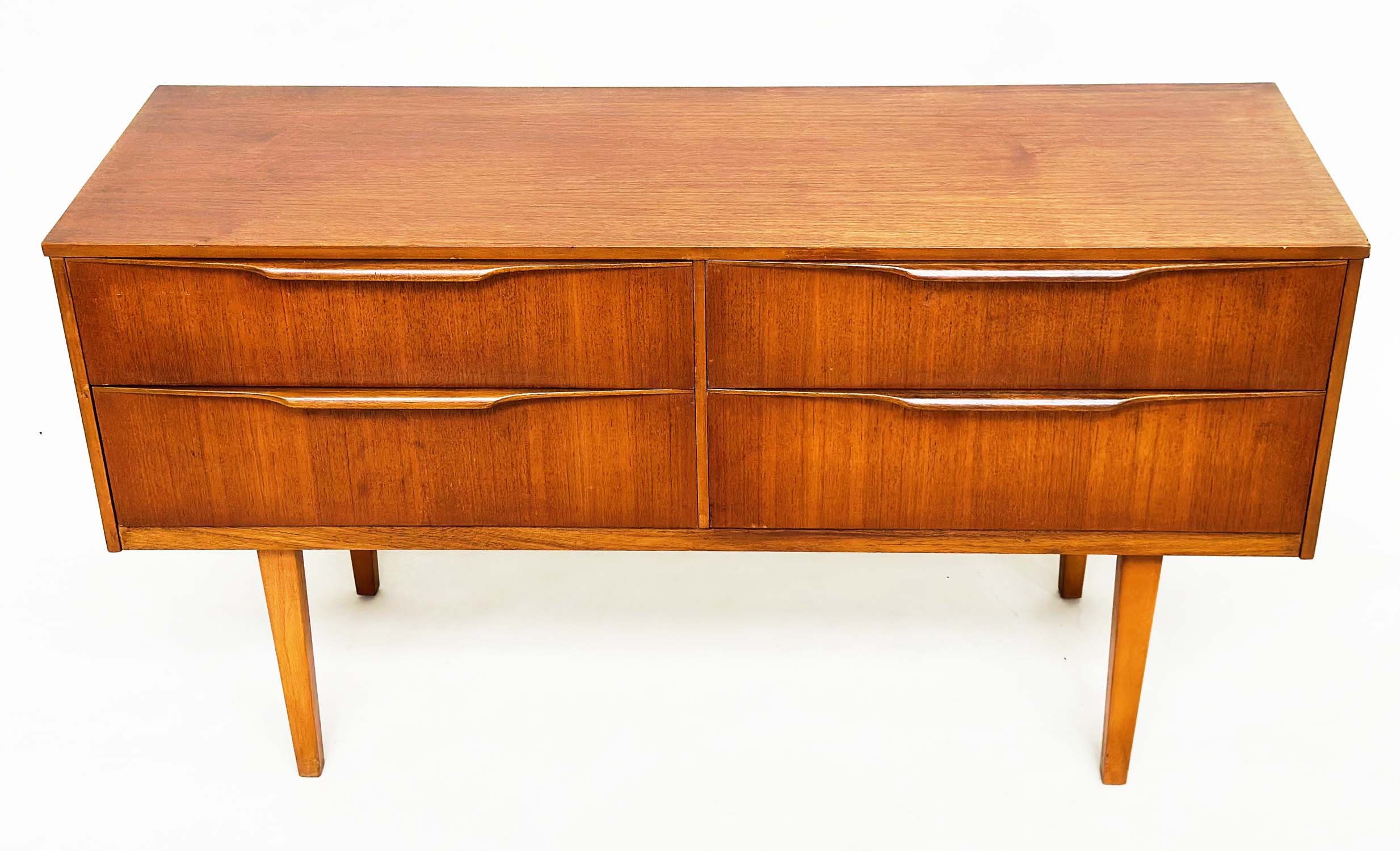 AUSTIN SUITE LOW CHEST, 1970s teak with four drawers, 128cm W x 70cm H x 41cm D. - Image 7 of 11