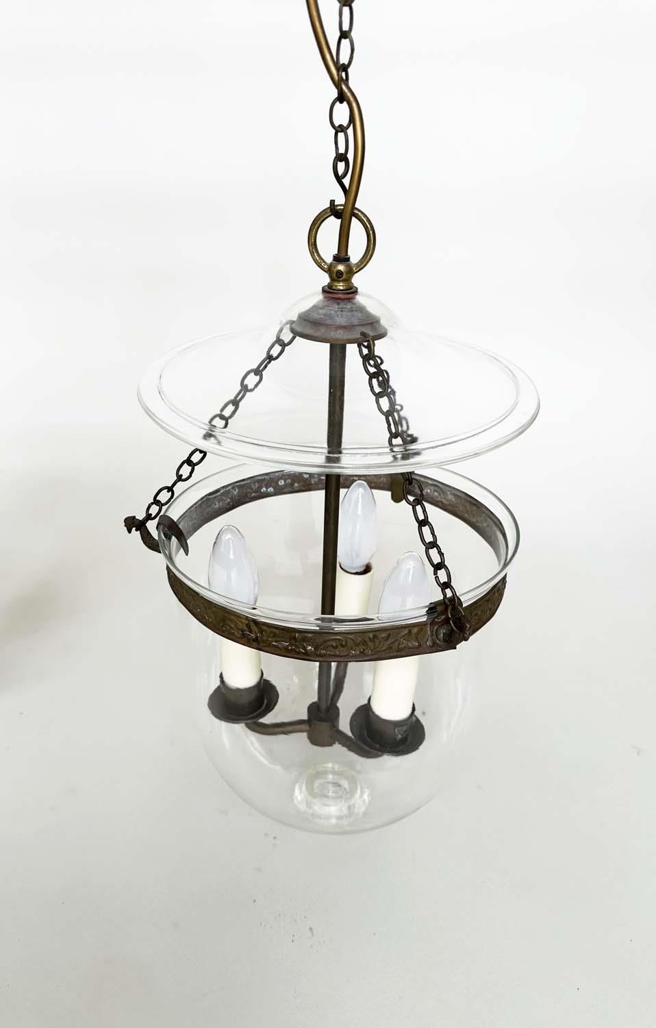 HALL LANTERNS, a pair, glass and bronzed metal each with three lights, 40cm H x 23cm. (2) - Image 2 of 4