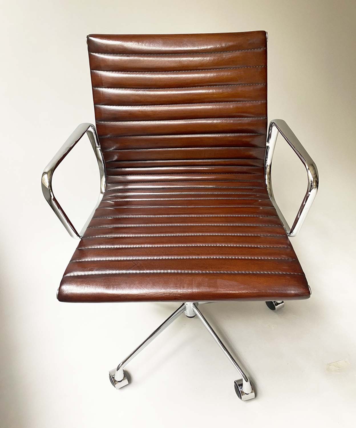 REVOLVING DESK CHAIR, Charles and Ray Eames inspired, with ribbed natural tan leather upholstered - Image 9 of 10