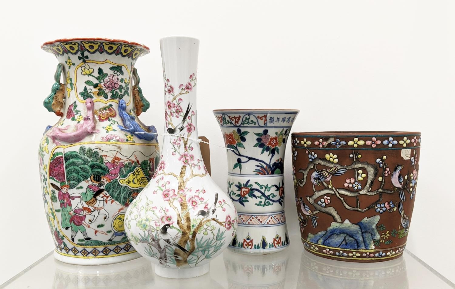 CHINESE PORCELAIN VASES, three including a bottle vase and a GU and I-Hing pottery jardiniere. (4)