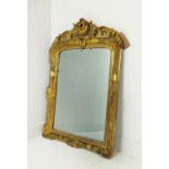 WALL MIRROR, mid 19th century French giltwood and gesso frame with shell crest, 118cm H x 79cm W.