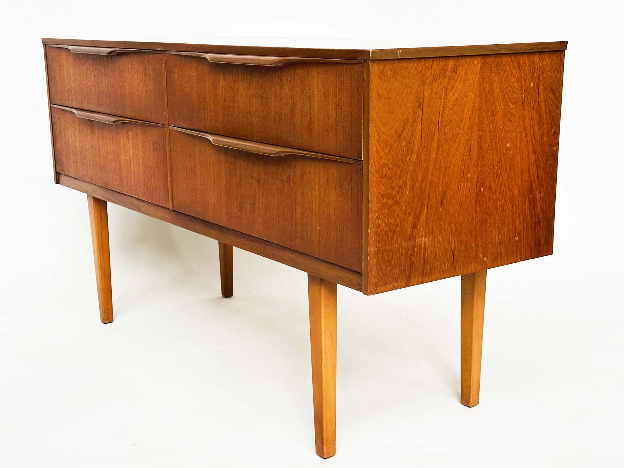AUSTIN SUITE LOW CHEST, 1970s teak with four drawers, 128cm W x 70cm H x 41cm D. - Image 6 of 11