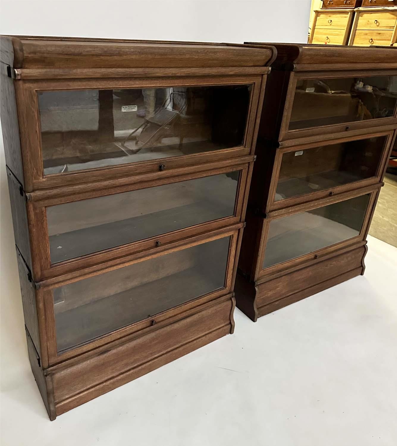 GLOBE WERNICKE BOOKCASES, a pair, early 20th century oak each with three glazed stacking sections, - Image 4 of 6