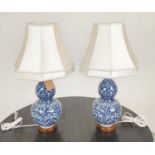 LAUREN RALPH LAUREN HOME TABLE LAMPS, a pair, blue and white double gourd ceramic, with shades, 72cm