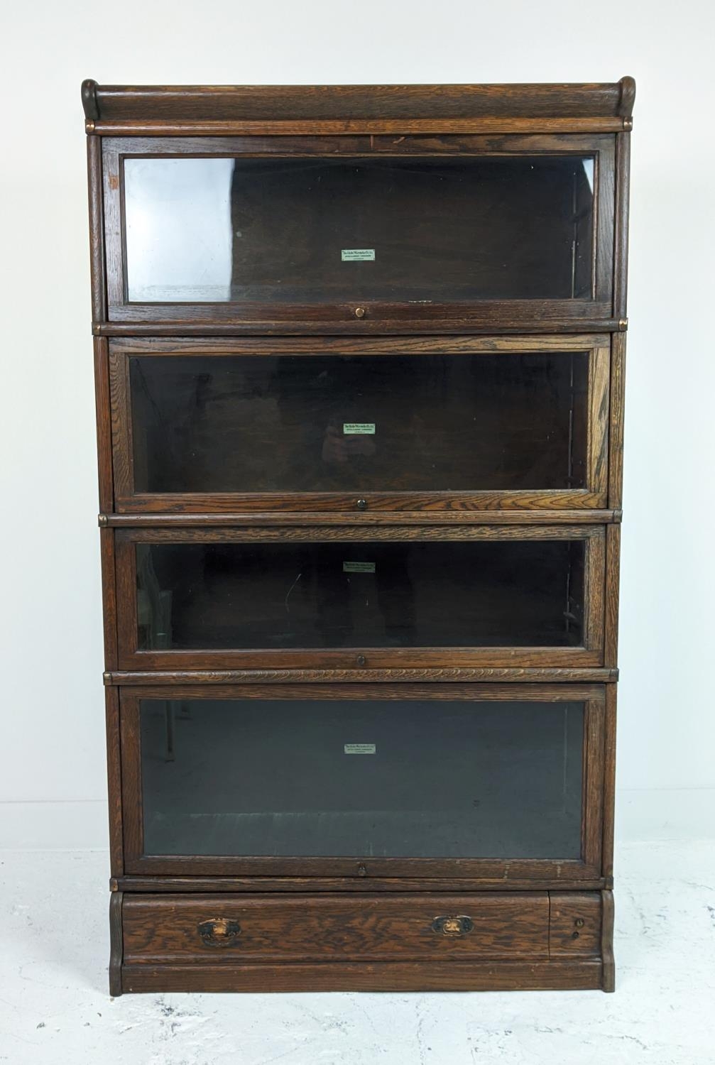GLOBE WERNICKE BOOKCASE, early 20th century oak, four tier with glazed doors and drawer to base, - Image 9 of 9