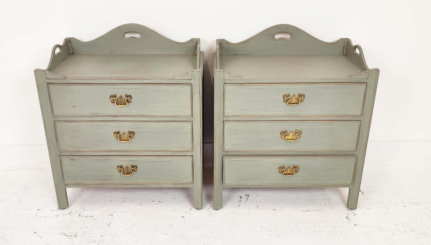 BEDSIDE CHESTS, a pair, grey painted, each with three drawers, labelled William L Maclean, 68cm H