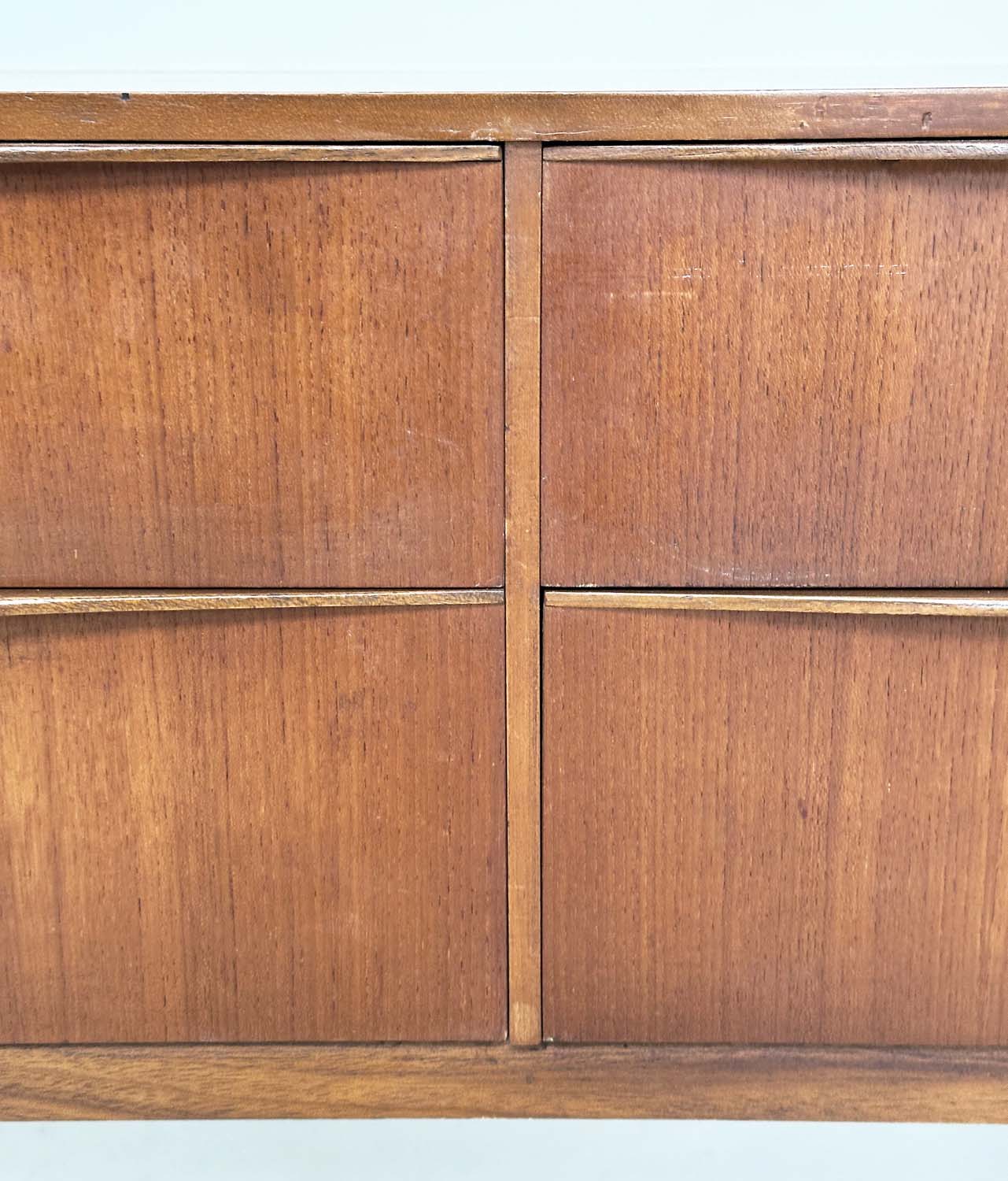 AUSTIN SUITE LOW CHEST, 1970s teak with four drawers, 128cm W x 70cm H x 41cm D. - Image 3 of 11