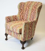 WING ARMCHAIR, 103cm H x 73cm, Georgian revival in geometric upholstery on rear castors.