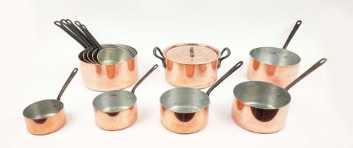 BATTERIE DE CUISINE, French copper, eleven pans, one with a lid. (11)