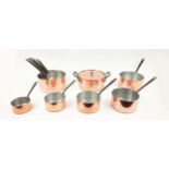 BATTERIE DE CUISINE, French copper, eleven pans, one with a lid. (11)