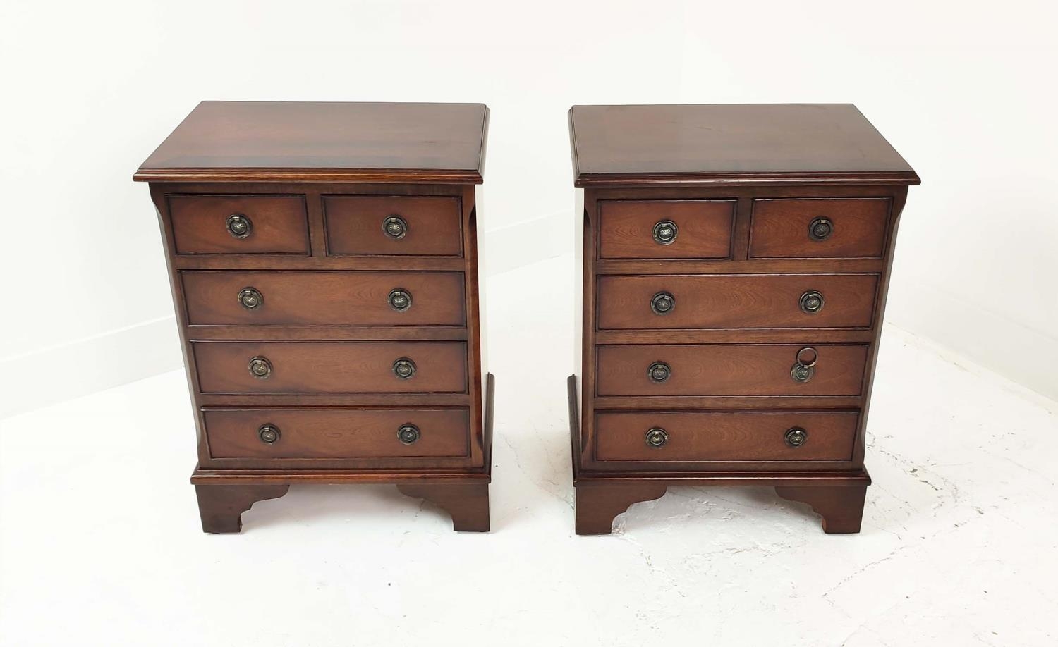 BEDSIDE CHESTS, a pair, Georgian style mahogany, each with five drawers, 64cm H x 39cm W x 33cm