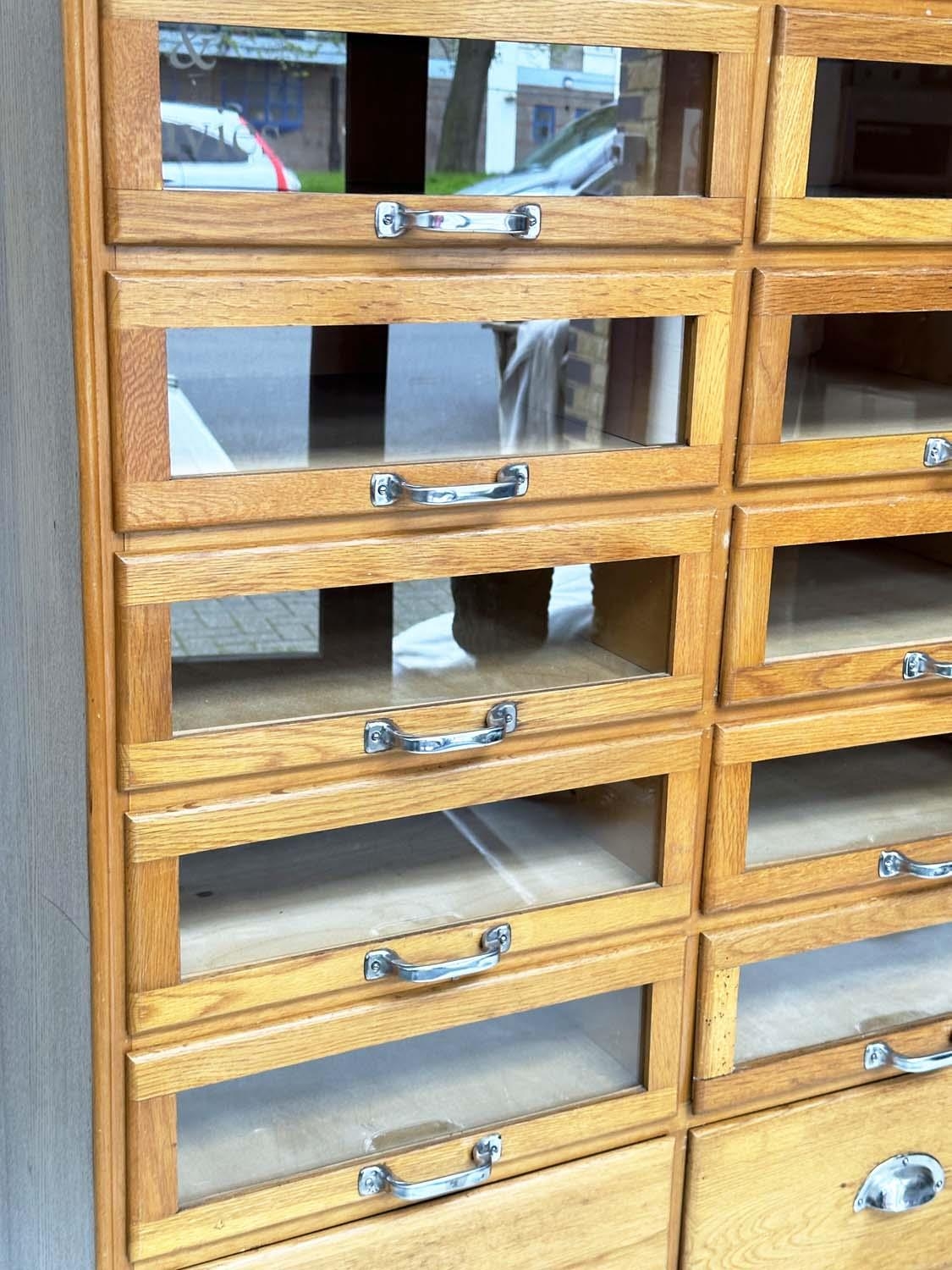 HABERDASHERY CABINET, mid 20th century oak with sixteen glazed drawers above four drawers, 199cm H x - Bild 4 aus 8