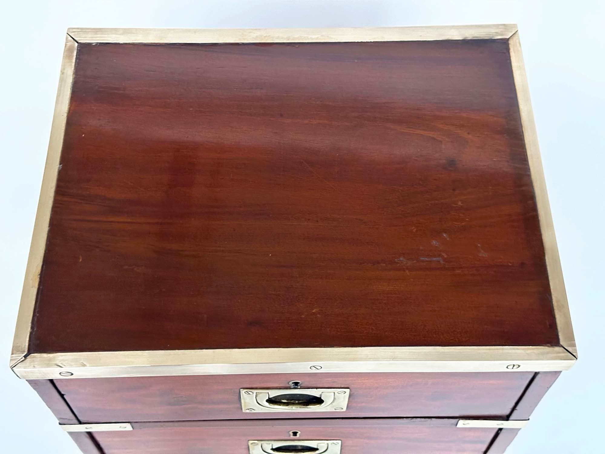 CAMPAIGN CHESTS, a pair, mahogany and brass bound each with three drawers and turned supports, - Image 6 of 10