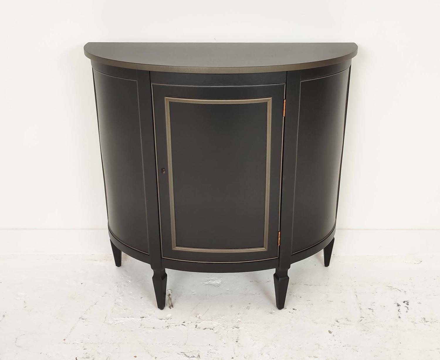 DEMI LUNE SIDE CABINET, black painted, lockable door, containing single shelf inside, 91.5cm x