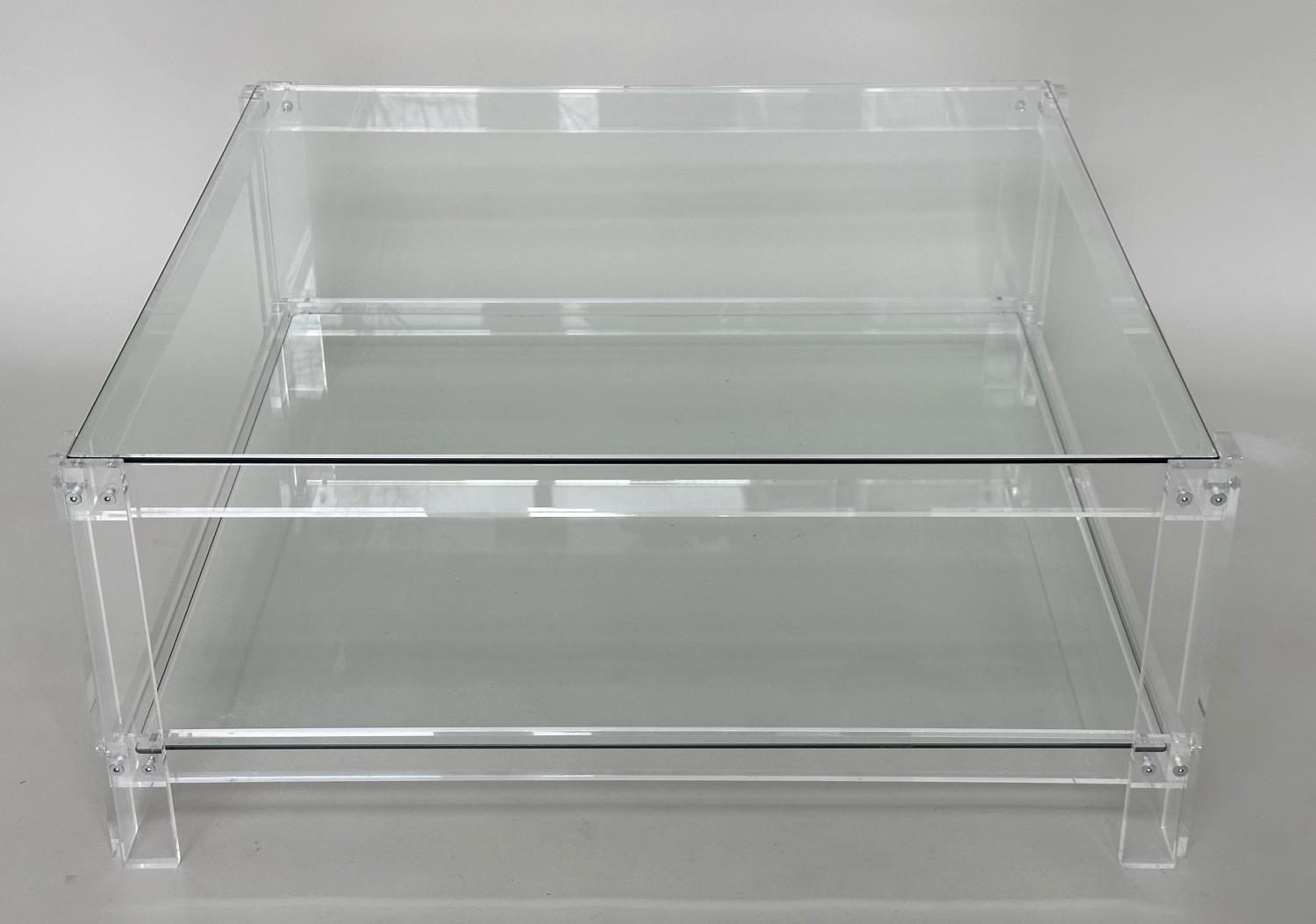 LUCITE LOW TABLE, square glazed raised upon lucite supports with undertier, 90cm x 90cm x 38cm.