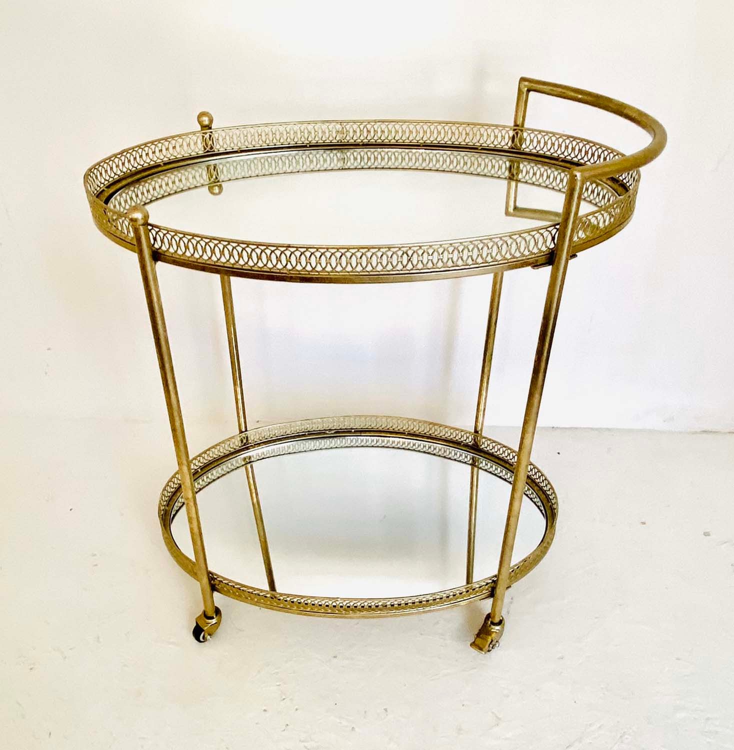 MAISON JANSEN STYLE COCKTAIL TROLLEY, silvered metal frame with mirrored glass, 87cm H x 78cm x 47cm