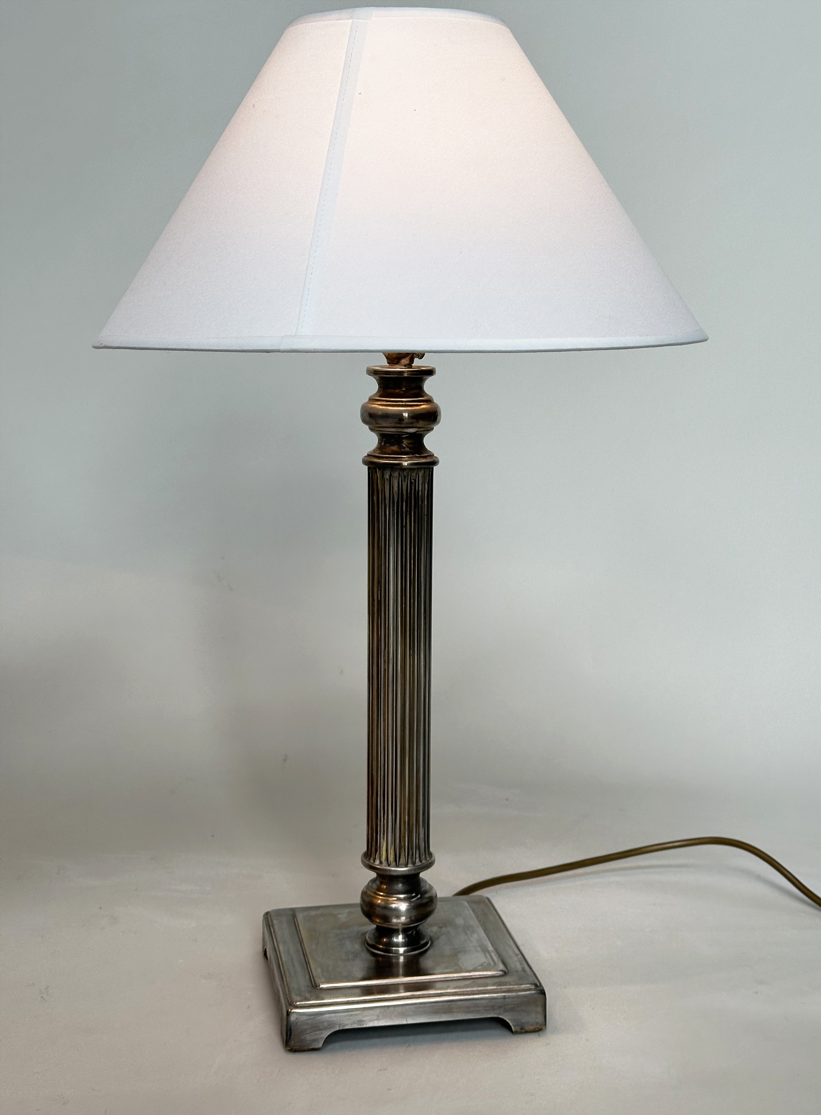 TABLE LAMPS, a pair, silvered metal each with reeded column, and square bases (with shades), 66cm H. - Image 2 of 6