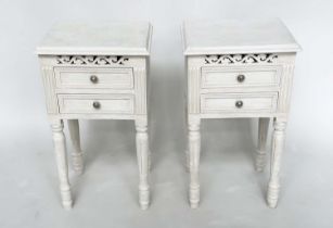 BEDSIDE CHESTS, a pair, French style traditionally grey painted each with two drawers, pierced