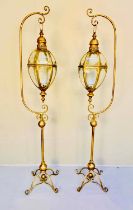 LANTERNS ON STANDS, a pair, regency style, gilt metal, 163cm H x 35cm x 33cm. (2)