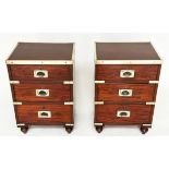 CAMPAIGN CHESTS, a pair, mahogany and brass bound each with three drawers and turned supports,