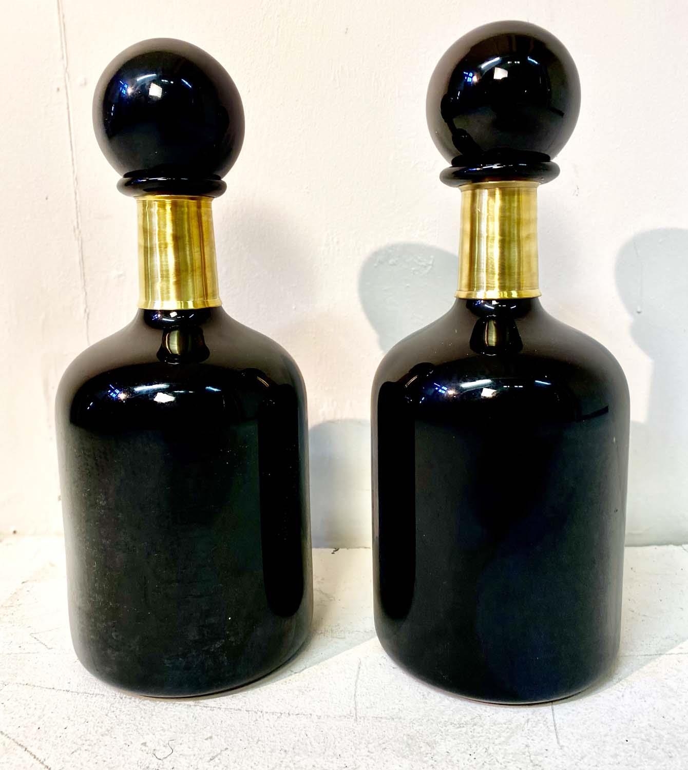 DECANTERS, a pair, Murano style black glass and gilt metal, 43cm H x 18cm W. (2)