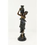 AFTER LOUIS AUGUSTE MOREAU (1855-1919), Woman with a water jug, patinated bronze on a circular