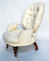 SLIPPER ARMCHAIR, 19th century button upholstered, yellow fabric with turned front supports, 46cm W.