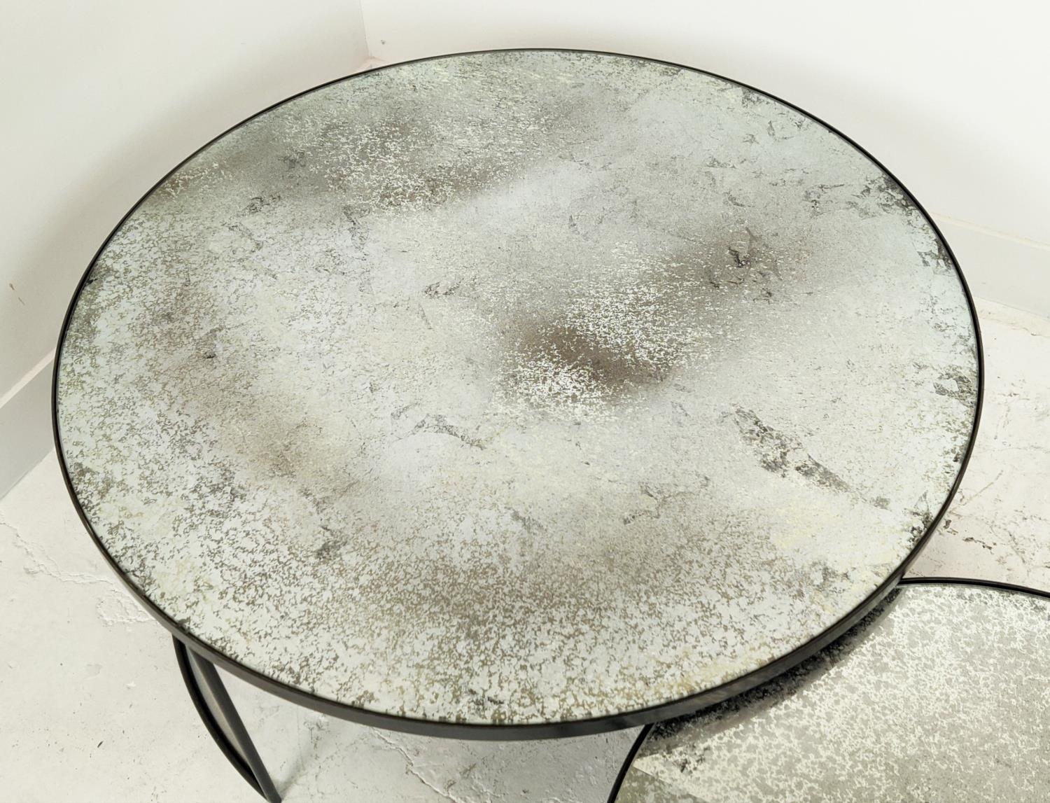 LOW TABLES, a nesting pair, with circular antiqued mirrored tops, largest 90cm W x 42cm H. - Image 4 of 8