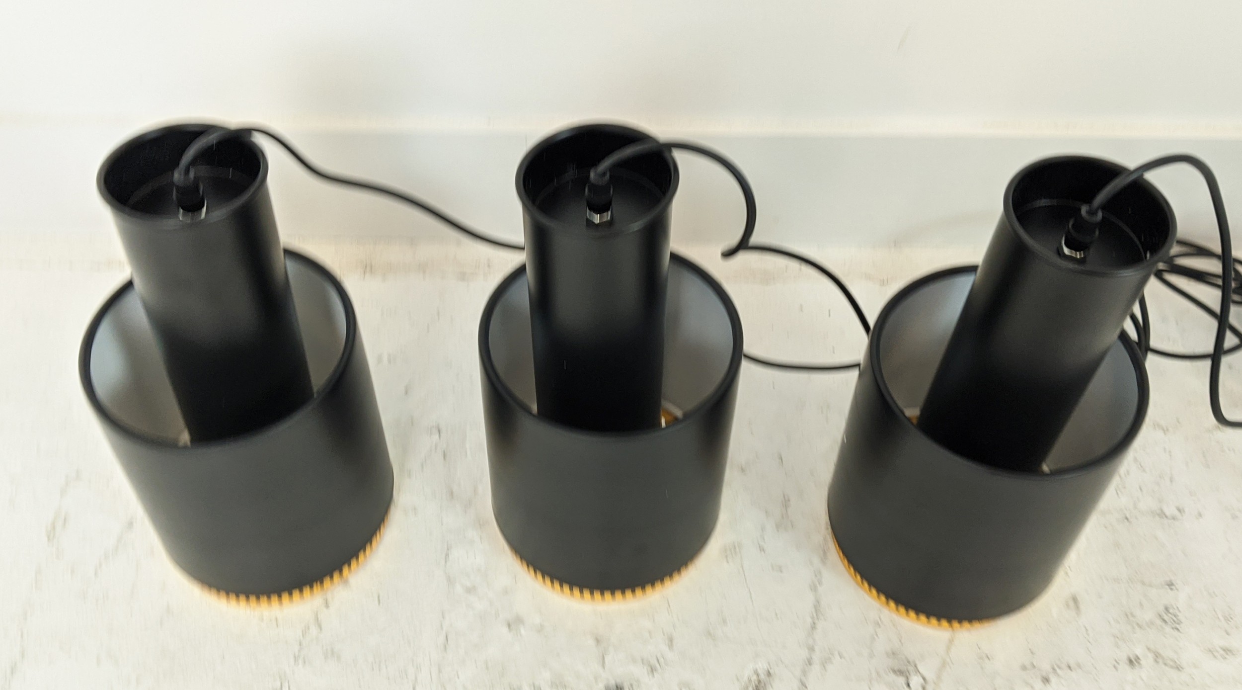 PENDANT LIGHTS, a set of three, 1970s Italian style, black painted metal with gilt detail 45.5cm - Image 3 of 6