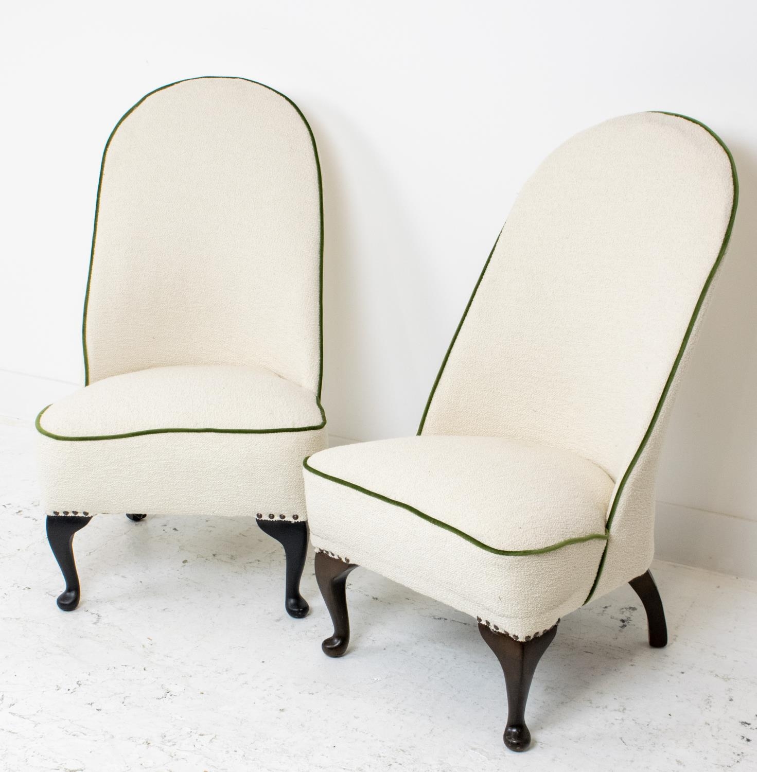 SLIPPER CHAIRS, a pair, boucle wool with green velvet piping, 89cm H x 53cm x 65cm. (2)