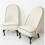 SLIPPER CHAIRS, a pair, boucle wool with green velvet piping, 89cm H x 53cm x 65cm. (2)