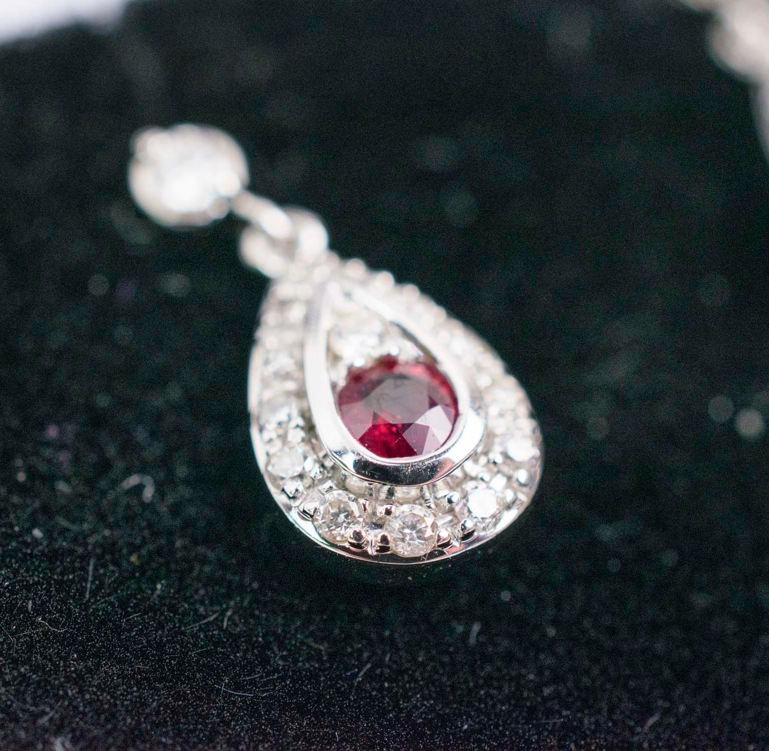 A PAIR OF 18CT WHITE GOLD RUBY AND DIAMOND PENDANT EARRINGS, each of tear-drop form, butterfly - Image 2 of 2