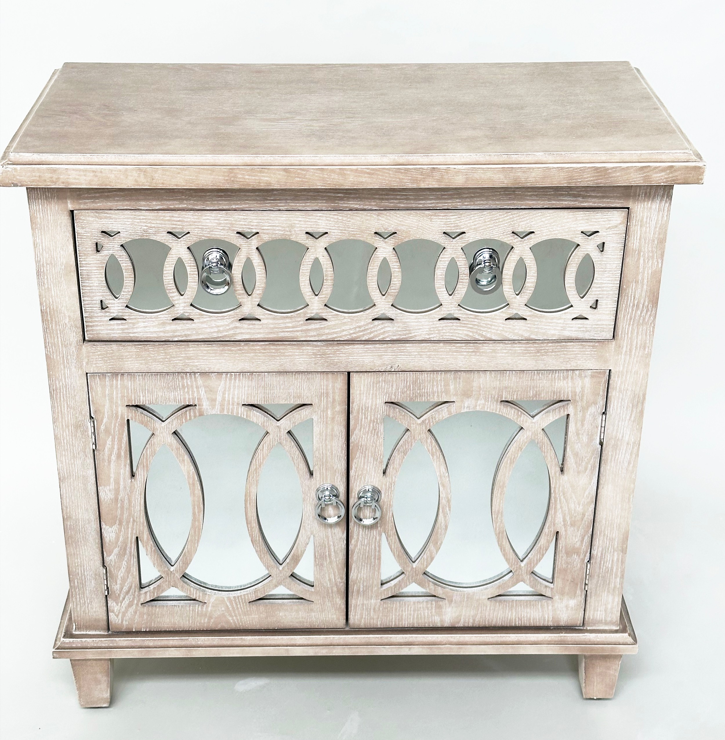 SIDE CABINET, limed oak, mirror panelled and tracery decorated with drawer and two doors, 80cm x