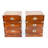 CAMPAIGN STYLE CHESTS, a pair, yewwood and brass bound each with three drawers, 46cm x 38cm x 63cm