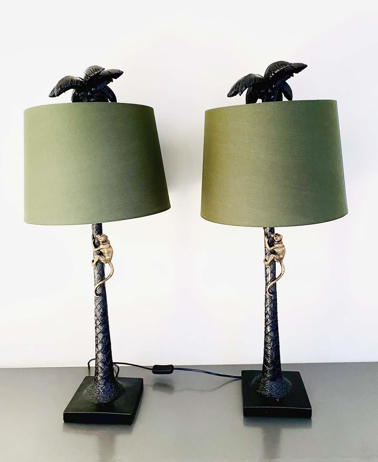 TABLE LAMPS, a pair, with shades, 86cm H, bases in the form of palm trees with a climbing monkey. (