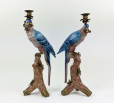 CANDLESTICKS, a pair, parrot design, ceramic and gilt metal, 51cm H. (2)