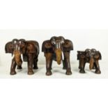 ELEPHANT CHAIRS AND TABLE, hardwood, chairs 75cm H x 61cm x 81cm, table 51cm H x 49cm x 63cm. (3)