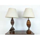 TABLE LAMPS, a pair, of helix timber form, with linen shades, 90cm H approx. (2)