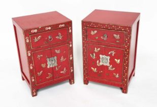 CHINESE CABINETS, a set of two, scarlet lacquered and butterfly decorated, each with two doors and