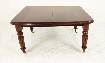 DINING TABLE, Victorian mahogany with two extra leaves, winder and ceramic castors, 72cm H x 117cm W