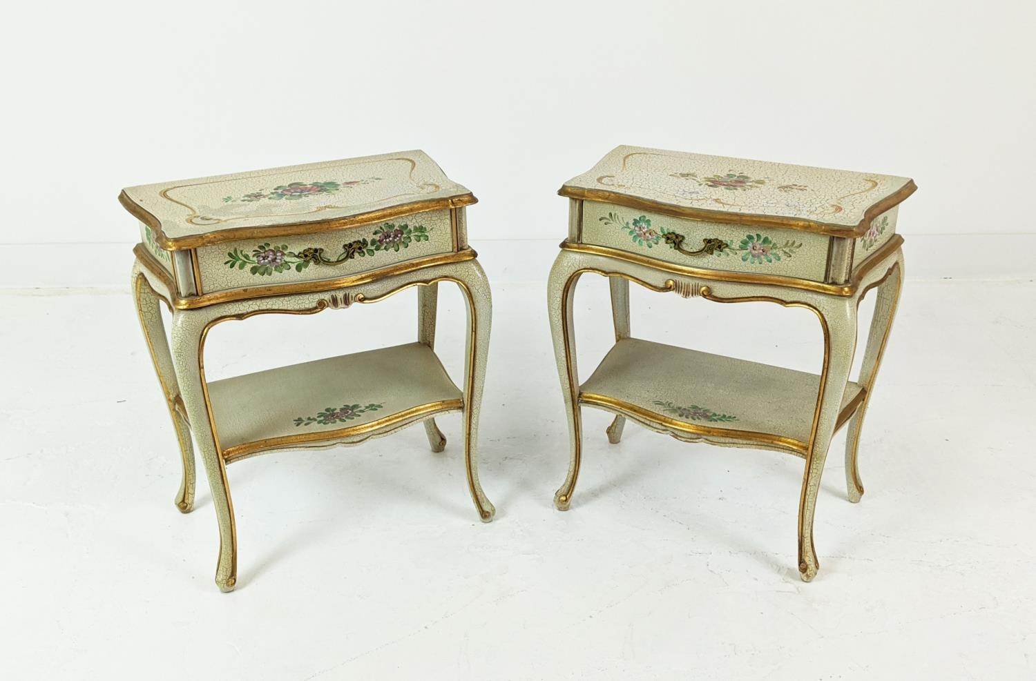 SERPENTINE BEDSIDE TABLES, Italianate craquelure, floral painted and gilt heightened, each with