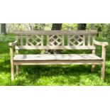 GARDEN BENCH, weathered teak with lattice back and slatted seat, jointed and dowelled, 160cm W.