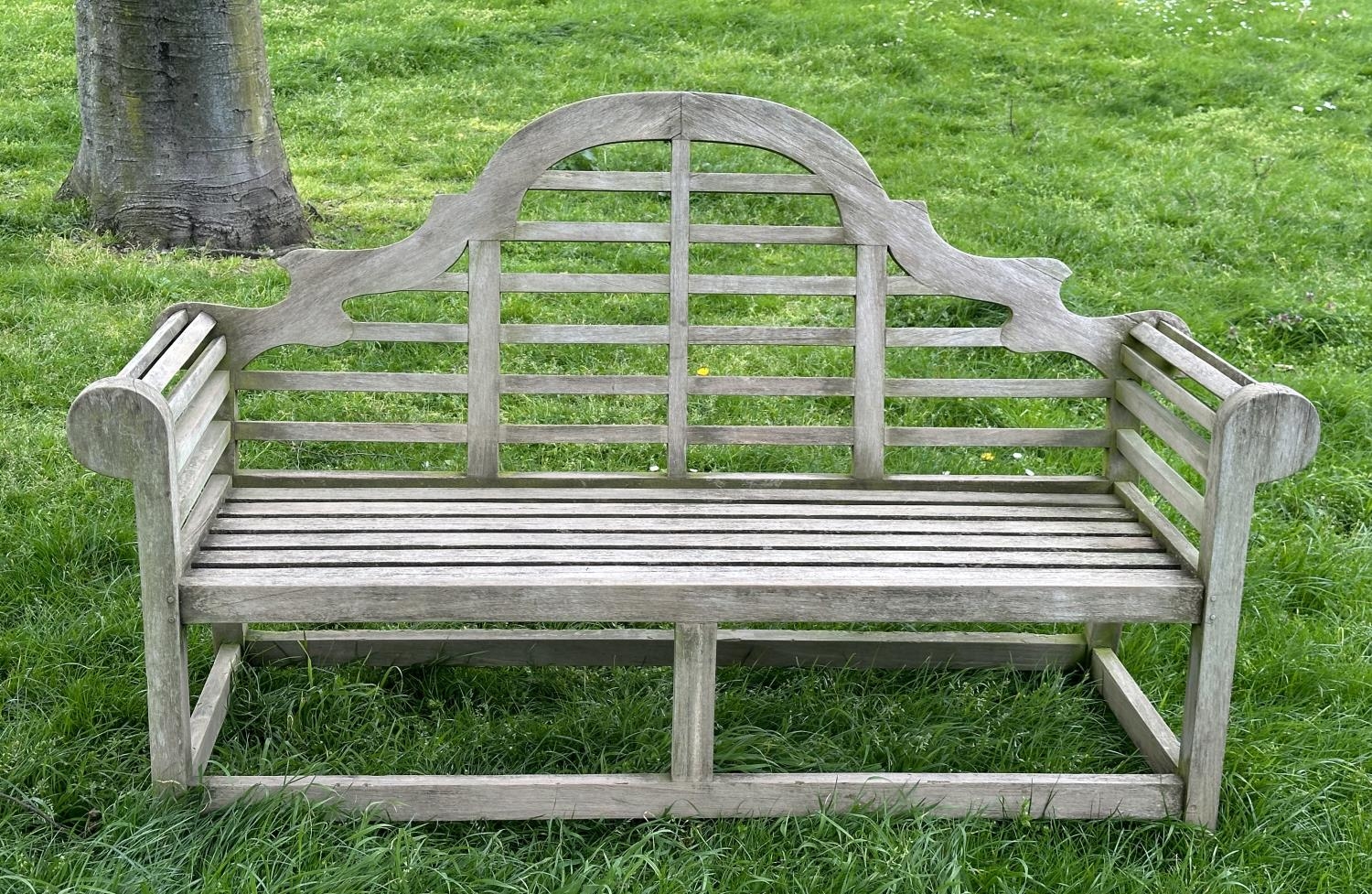 LUTYENS STYLE GARDEN BENCH, weathered teak slatted after a design by Sir Edwin Lutyens, 160cm W.