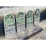 ARCHITECTURAL GARDEN WALL MIRRORS, a set of four, distressed metal arched frames, 60cm H x 36cm. (4)