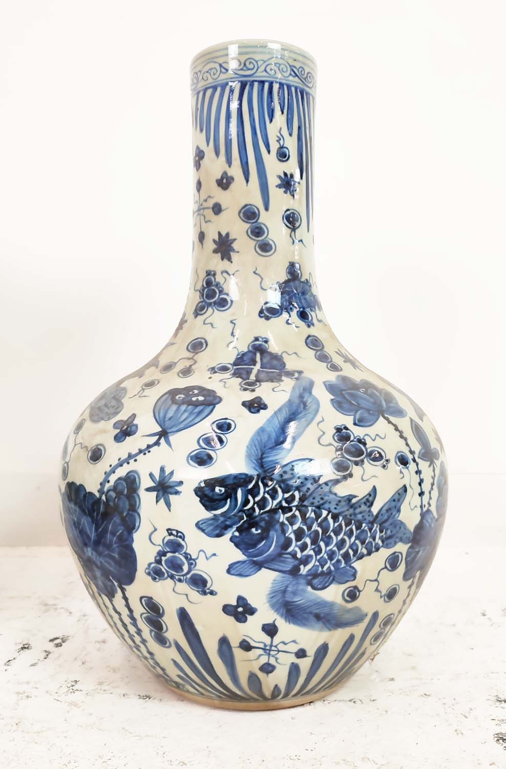 BOTTLE VASES, a pair, Chinese style blue and white ceramic, 60cm H x 38cm W. (2) - Image 2 of 3