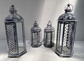 GARDEN LANTERNS, a set of four, in a distressed painted finish, two smaller 42cm H x 20cm W, and two