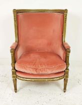 BERGERE A OREILLE, late 19th century French giltwood with peach velvet upholstery, 68cm x 100cm H.